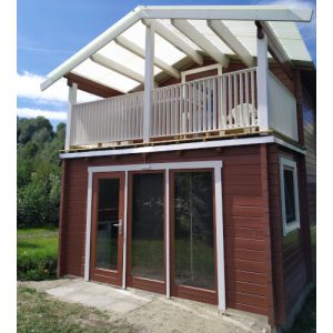 See-Camping-Guenztal_zweistoeckige-Huette_braun_Aussenansicht